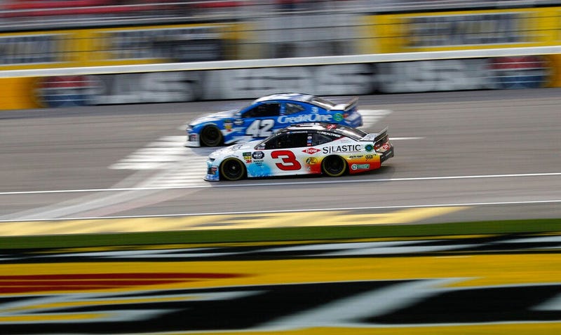 Austin Dillon (3) and Kyle Larson (42) drive during qualifying for a NASCAR Cup Series auto race at the Las Vegas Motor Speedway, Friday, March 1, 2019, in Las Vegas