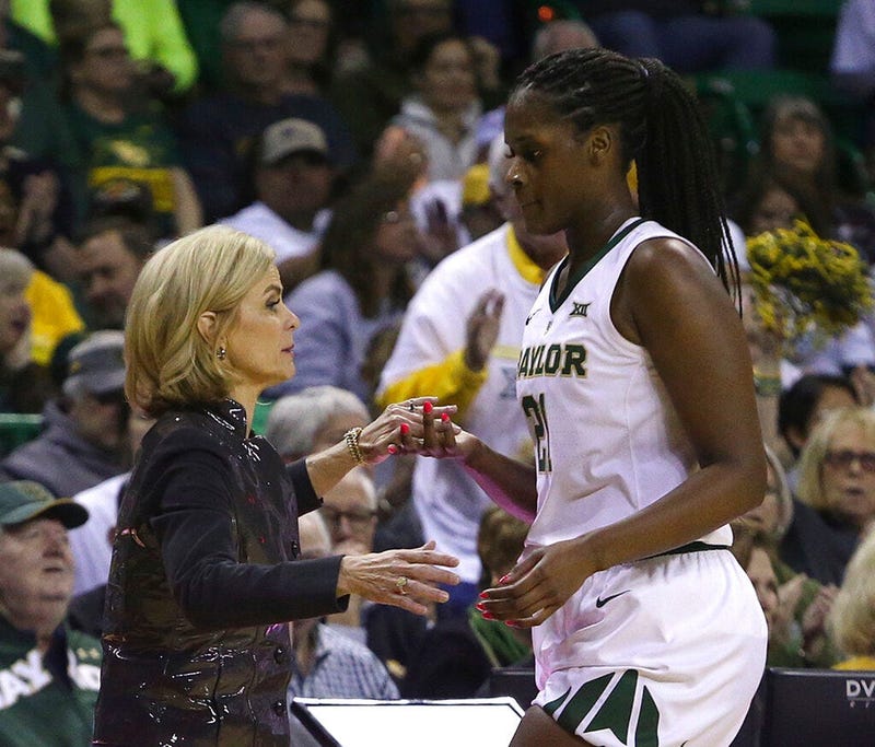 Baylor head coach Kim Mulkey thanks Baylor center Kalani Brown (21) as she head to the bench in the second half of an NCAA college basketball game, Saturday, March 2, 2019, in Waco, Texas. Baylor defeated Oklahoma State 76-44