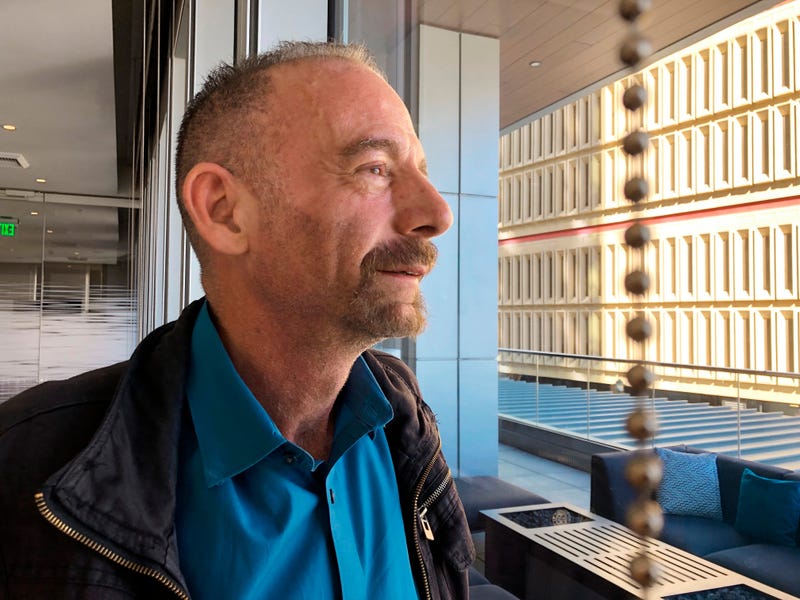 Timothy Ray Brown poses for a photograph, Monday, March 4, 2019, in Seattle. Brown, also known as the "Berlin patient," was the first person to be cured of HIV infection, more than a decade ago.