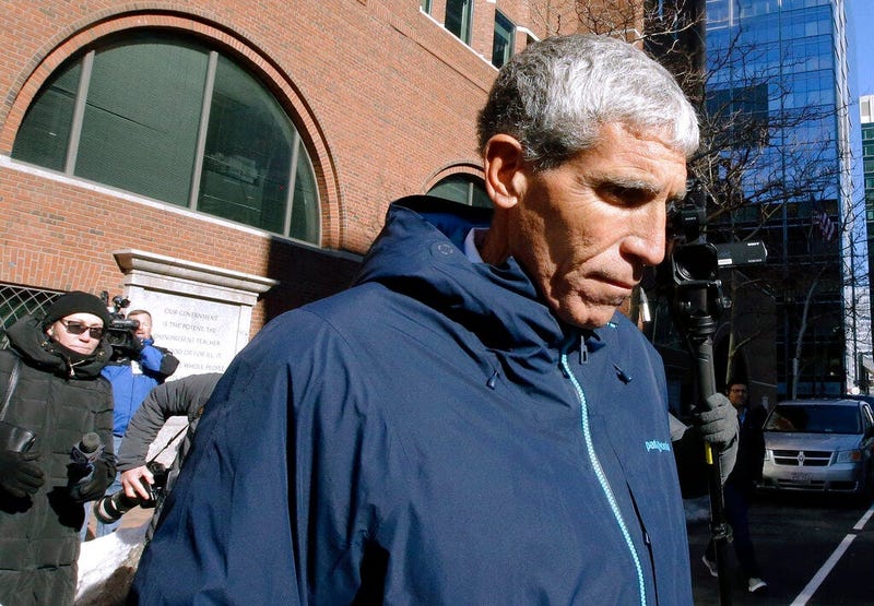 William "Rick" Singer founder of the Edge College & Career Network, departs federal court in Boston on Tuesday, March 12, 2019, after he pleaded guilty to charges in a nationwide college admissions bribery scandal.