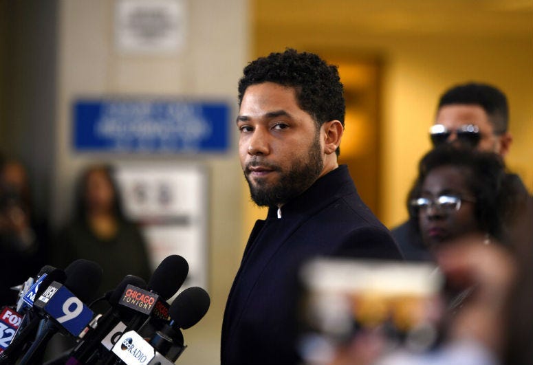 Actor Jussie Smollett talks to the media before leaving Cook County Court after his charges were dropped.