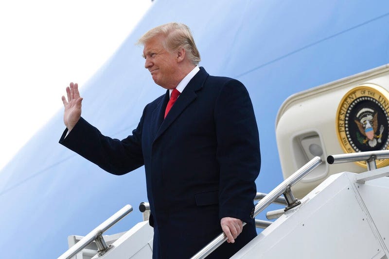 President Donald Trump walks towards the steps of Air Force One at Andrews Air Force Base.