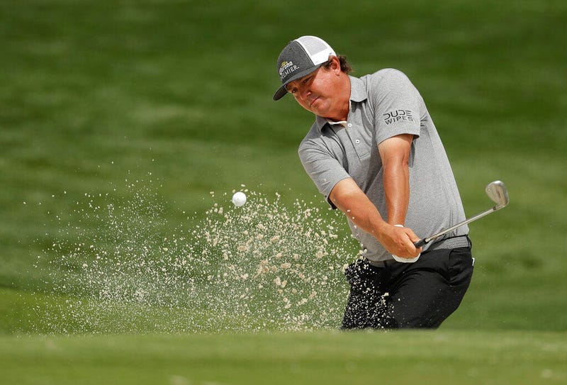 Jason Dufner hits from a sand trap on the 16th hole during the second round of the Wells Fargo Championship golf tournament at Quail Hollow Club in Charlotte, N.C., Friday, May 3, 2019.