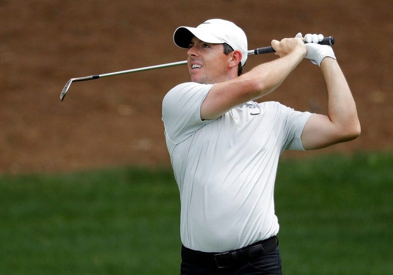 Rory McIlroy, of Northern Ireland, watches his approach shot on the second hole during the third round of the Wells Fargo Championship golf tournament at Quail Hollow Club in Charlotte, N.C., Saturday, May 4, 2019.