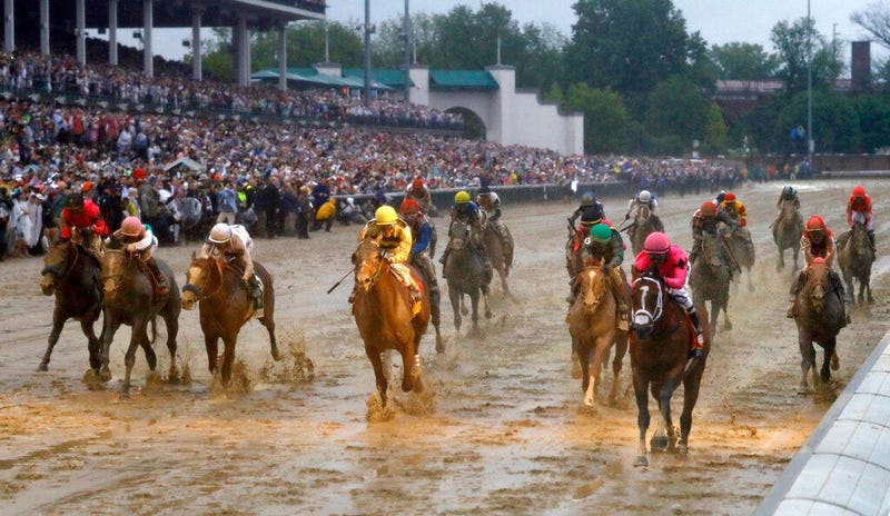 Luis Saez rides Maximum Security across the finish line first followed by Flavien Prat on Country House during the 145th running of the Kentucky Derby horse race at Churchill Downs