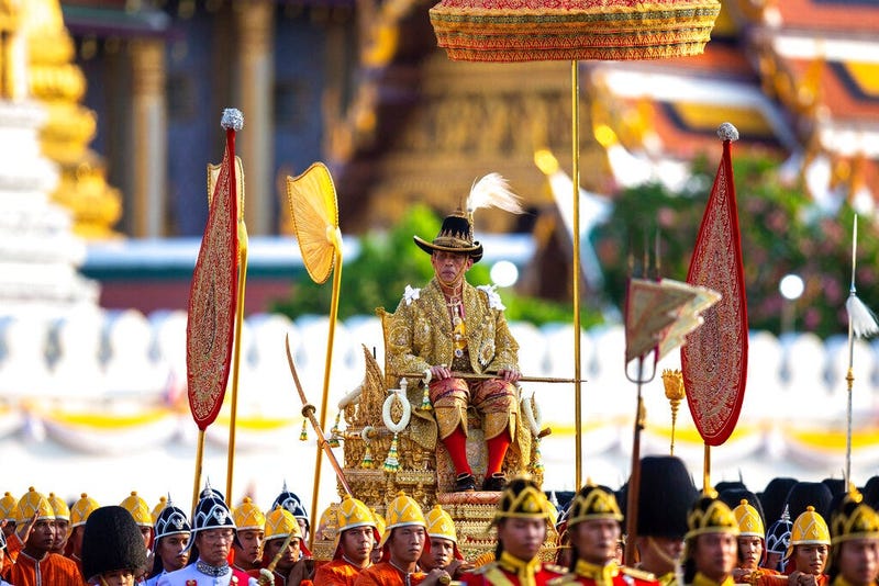 Thailand’s King Maha Vajiralongkorn is carried on a palanquin through the streets outside the Grand Palace for the public to pay homage during the second day of his coronation ceremony in Bangkok, Sunday, May 5, 2019. Vajiralongkorn was officially crowned