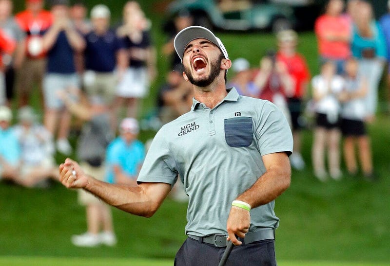 Max Homa celebrates after winning the Wells Fargo Championship golf tournament at Quail Hollow Club in Charlotte, N.C., Sunday, May 5, 2019.