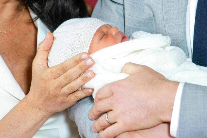 Britain's Prince Harry and Meghan, Duchess of Sussex, during a photocall with their newborn son