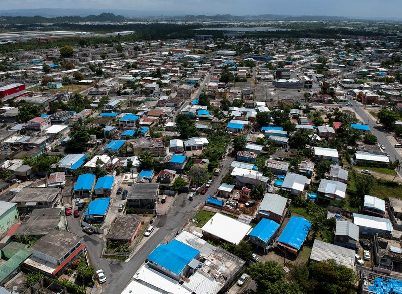This June 18, 2018, file photo shows an aerial view of the Amelia neighborhood in the municipality of Catano, east of San Juan, Puerto Rico. 