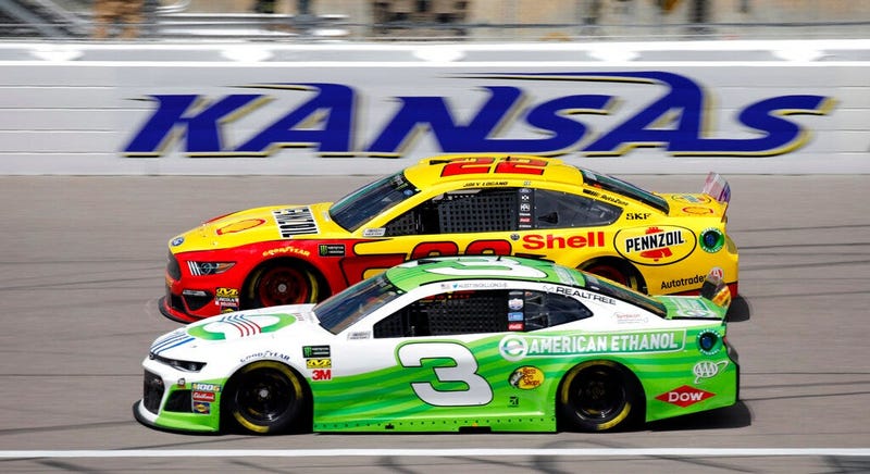Drivers Joey Logano (22) and Austin Dillon (3) practice for the NASCAR Cup Series auto race at Kansas Speedway in Kansas City, Kan., Friday, May 10, 2019.