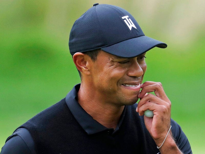 Tiger Woods reacts as he walks off the 7th green during the second round of the PGA Championship golf tournament, Friday, May 17, 2019, at Bethpage Black in Farmingdale, N.Y. (