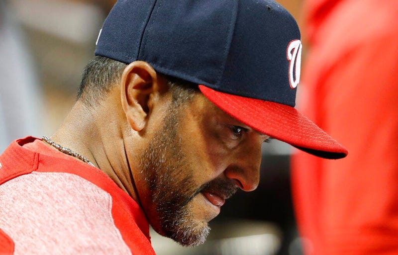 Washington Nationals manager Dave Martinez reacts in the dugout during the eighth inning of the team's 6-1 loss to the New York Mets in a baseball game Wednesday, May 22, 2019, in New York.