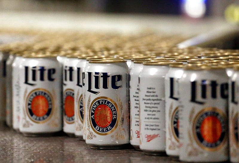 newly-filled and sealed cans of Miller Lite beer 