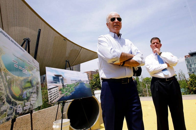Former vice president and Democratic presidential candidate Joe Biden speaks on Wednesday, June 5, 2019, beside Boston Mayor Marty Walsh, right, and renderings of a park in being constructed in Boston in honor of Martin Richard, the youngest victim of the