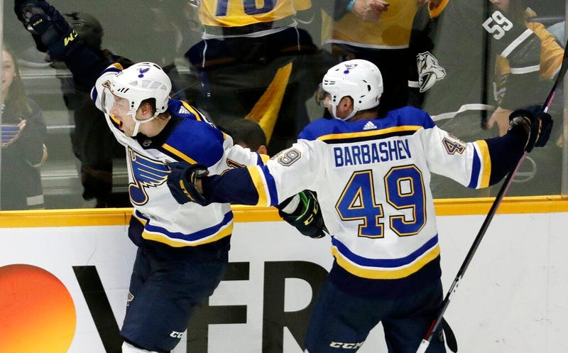 St. Louis Blues right wing Vladimir Tarasenko, of Russia, left, celebrates with Ivan Barbashev (49), of Russia