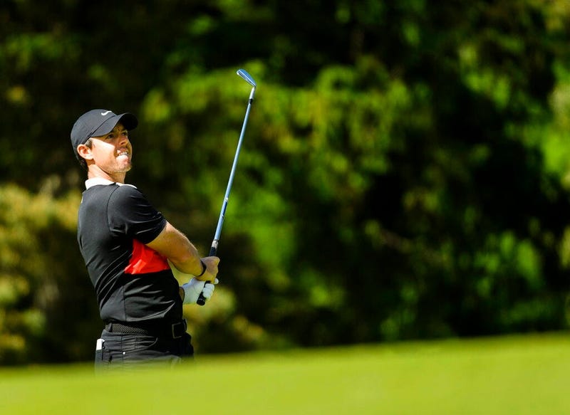 Rory McIlroy, of Northern Ireland, watches his approach shot on the 17th hole during the third round of the Canadian Open golf tournament in Ancaster, Ontario, Saturday, June 8, 2019.