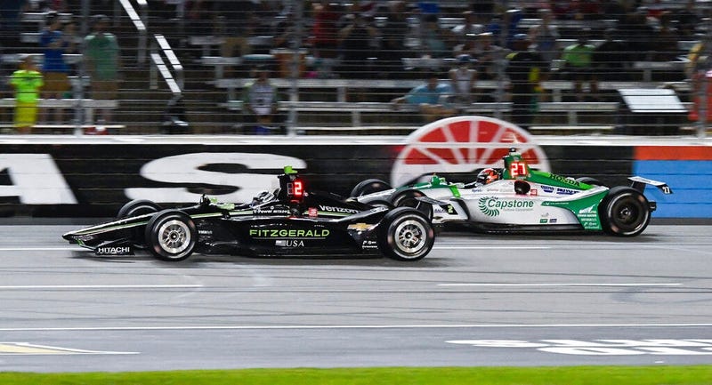 Josef Newgarden (2) leads Alexander Rossi (27) during the IndyCar auto race at Texas Motor Speedway, Saturday, June 8, 2019, in Fort Worth, Texas.