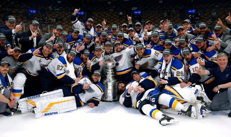 The St. Louis Blues celebrate with the Stanley Cup after they defeated the Boston Bruins in Game 7 of the NHL Stanley Cup Final, Wednesday, June 12, 2019, in Boston. 