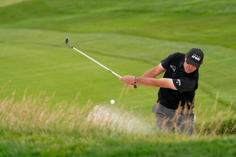 Phil Mickelson hits out of the bunker on the 10th hole during the first round of the U.S. Open Championship golf tournament Thursday, June 13, 2019, in Pebble Beach, Calif.