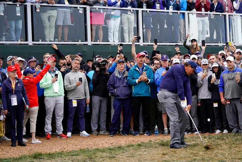 Phil Mickelson hits from the rough on the 18th hole during the second round of the U.S. Open golf tournament Friday, June 14, 2019, in Pebble Beach, Calif.