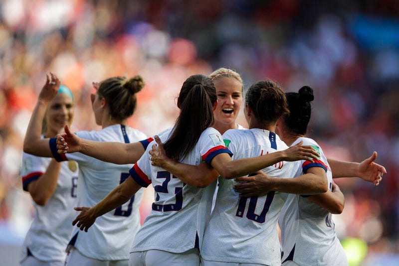 US players celebrate after teammate Carli Lloyd scored their side's third goal during the Women's World Cup Group F soccer match between United States and Chile at Parc des Princes in Paris, France, Sunday, June 16, 2019.