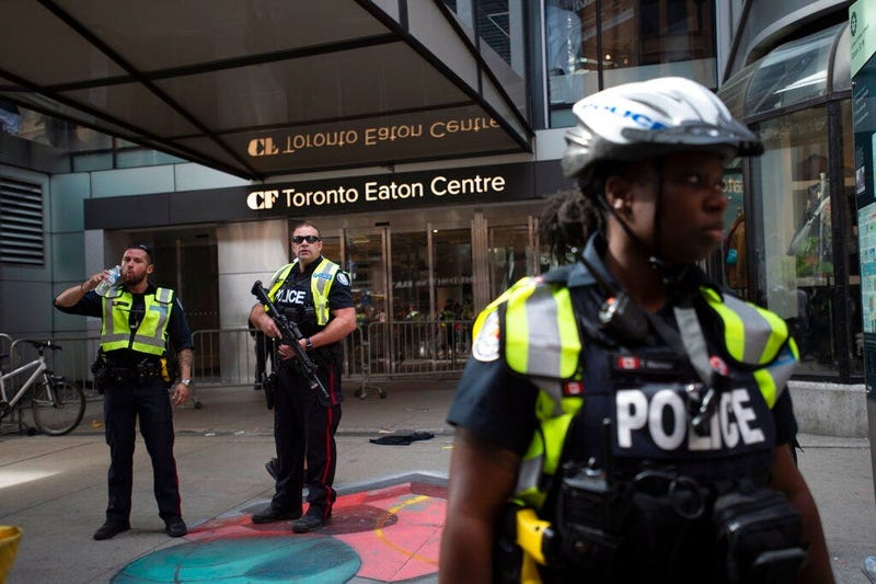 Toronto Police secure the scene where shots were fired during the Toronto Raptors NBA basketball championship parade in Toronto, Monday, June 17, 2019.