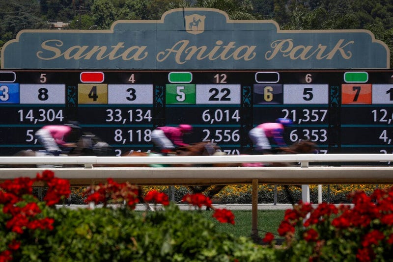 Horses finish the the first race during the last day of the winter/spring meet at the Santa Anita horse racing track Sunday, June 23, 2019, in Santa Anita, Calif.