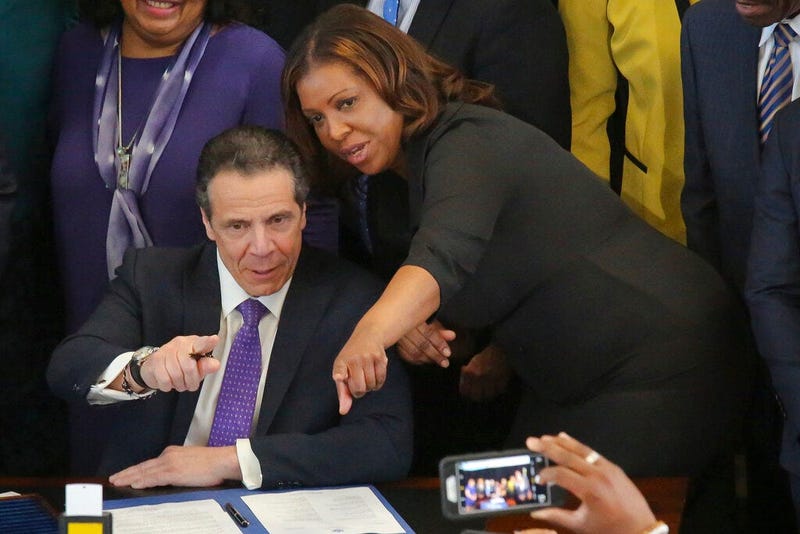 New York Public Advocate Letitia James, right, speaks with New York Gov. Andrew Cuomo