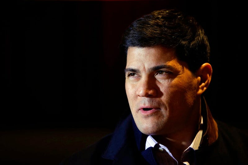 Tedy Bruschi speaks during an interview at the NFL Super Bowl XLVIII 
