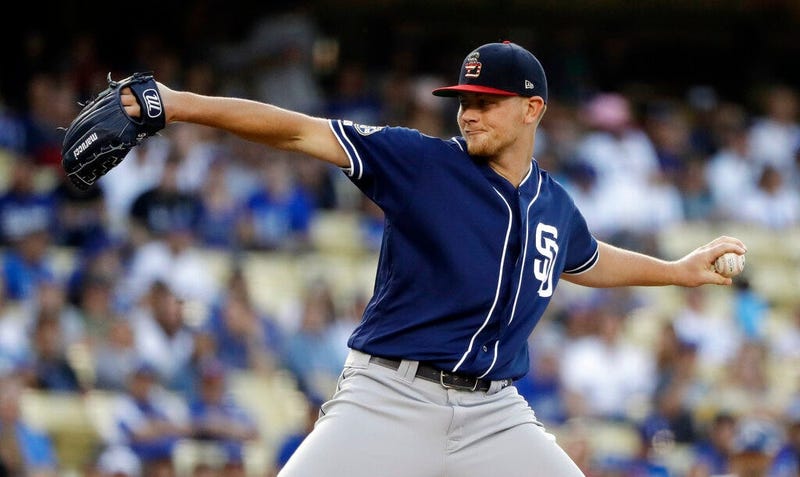 San Diego Padres starting pitcher Eric Lauer throws to the Los Angeles Dodgers during the first inning of a baseball game Friday, July 5, 2019, in Los Angeles.
