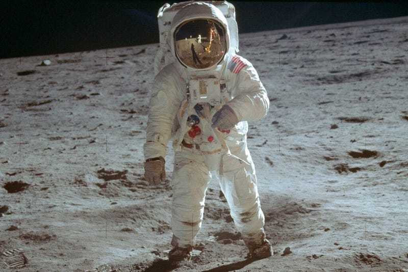 In this July 20, 1969 photo made available by NASA, astronaut Buzz Aldrin, lunar module pilot, walks on the surface of the moon during the Apollo 11 extravehicular activity.