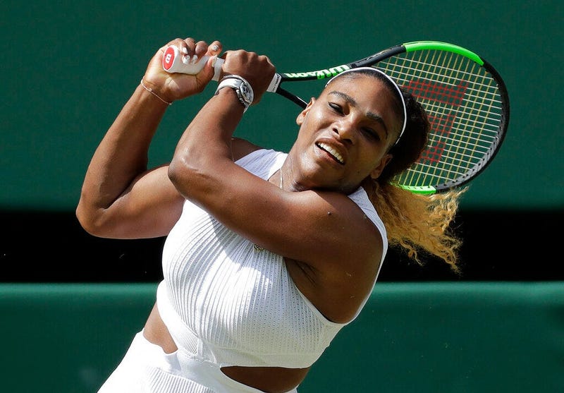 United States' Serena Williams returns to Czech Republic's Barbora Strycova in a Women's semifinal singles match on day ten of the Wimbledon Tennis Championships in London, Thursday, July 11, 2019.