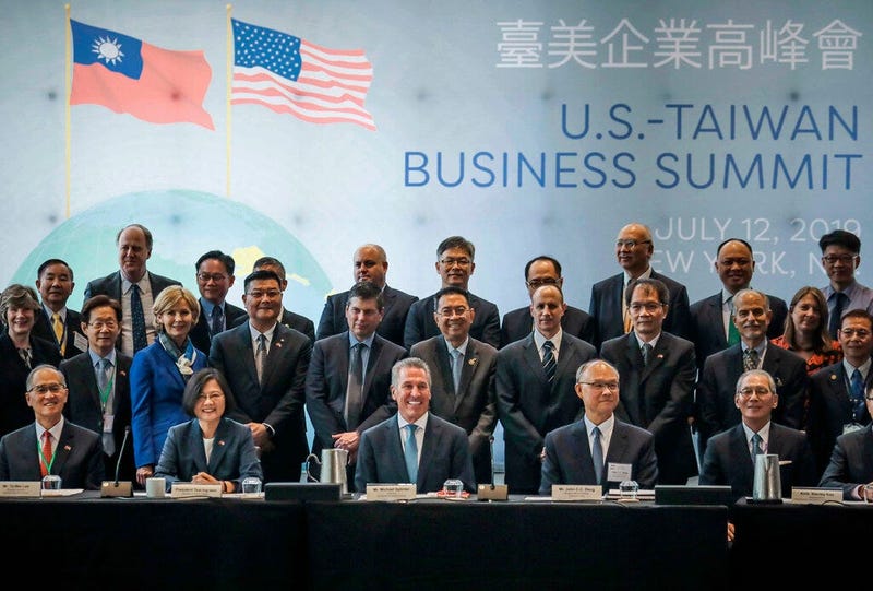 Taiwan President Tsai Ing-we, seated second from left, pose with participants at the U.S. Taiwan Business Summit, Friday July 12, 2019, in New York.