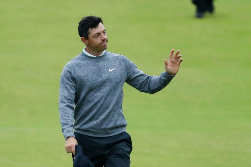 Northern Ireland's Rory McIlroy waves to the crowd as he walks onto the 18th green during the second round of the British Open Golf Championships at Royal Portrush in Northern Ireland, Friday, July 19, 2019.