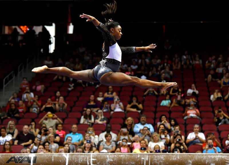 Simone Biles performs her balance beam routine during the GK US Classic gymnastics meet in Louisville, Ky., Saturday, July 20, 2019.