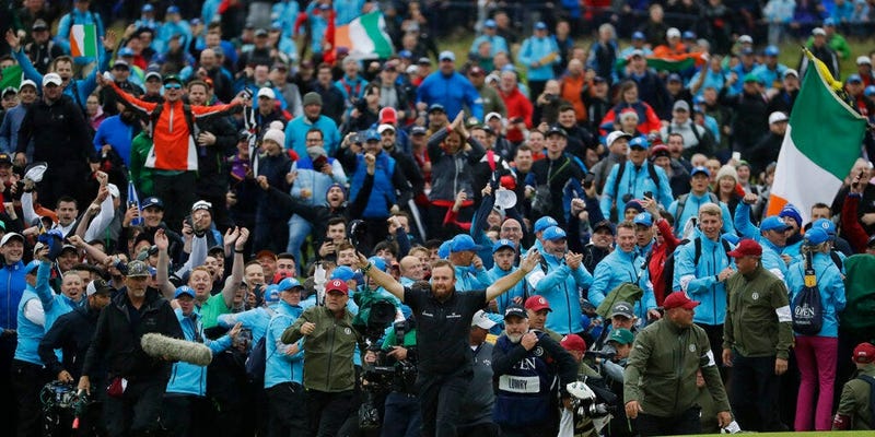 Ireland's Shane Lowry walks arms outstretched on the 18th green as he goes on to win the British Open Golf Championships at Royal Portrush in Northern Ireland, Sunday, July 21, 2019.