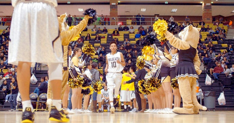 This image released by The WorkShop shows a scene from "Basketball or Nothing," a new docuseries that examines the hoops dreams of a rural, Arizona town in the heart of the Navajo Nation. The six-episode series debuts Friday on Netflix.