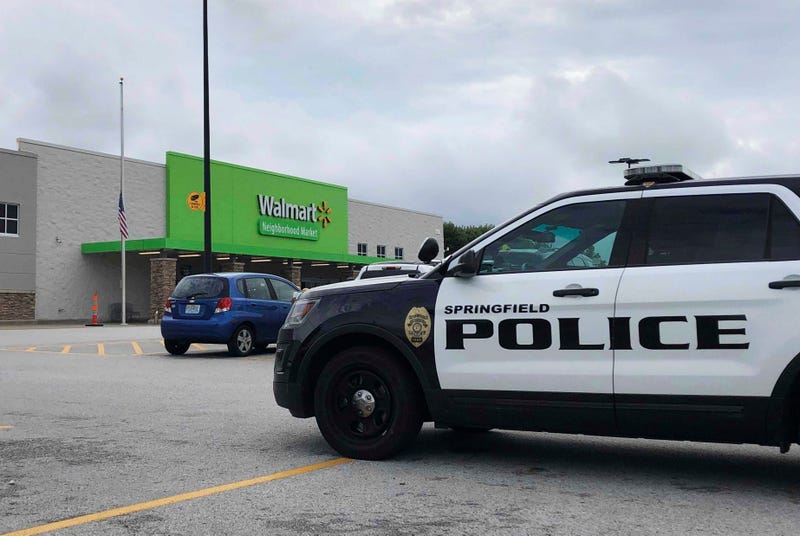 Springfield police respond to a Walmart in Springfield, Mo., Thursday afternoon, Aug. 8, 2019, after reports of a man with a weapon in the store. 