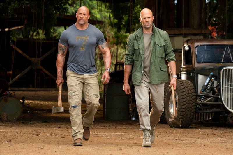 This image released by Universal Pictures shows Dwayne Johnson, left, and Jason Statham in a scene from "Fast & Furious Presents: Hobbs & Shaw."