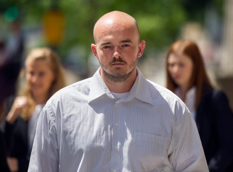 In this June 11, 2014 file photo, former Blackwater Worldwide guard Nicholas Slatten leaves federal court in Washington, after the start of his first-degree murder trial.