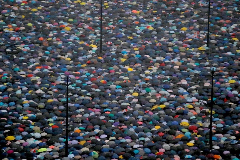 Protesters gather on Victoria Park in Hong Kong Sunday, Aug. 18, 2019. Thousands of people streamed into the park for what organizers hope will be a peaceful demonstration for democracy in the semi-autonomous Chinese territory.