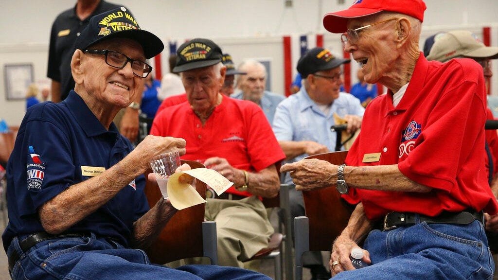 PHOTOS: WWII vets honored in Texas following D-Day events in France