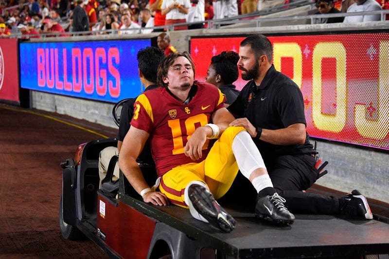 Southern California quarterback JT Daniels is carted off the field after being injured during the first half of an NCAA college football game against Fresno State Saturday, Aug. 31, 2019, in Los Angeles.