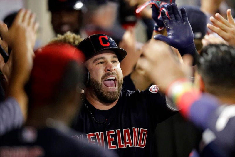Cleveland Indians' Jason Kipnis celebrates in the dugout after a two-run home run against the Los Angeles Angels during the second inning of a baseball game in Anaheim, Calif., Monday, Sept. 9, 2019. (