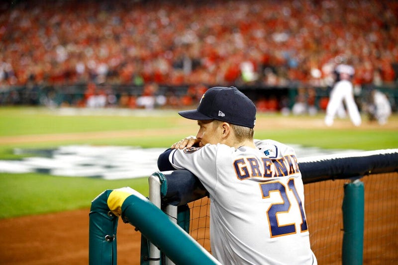 Houston Astros starting pitcher Zack Greinke watches during the sixth inning of Game 3 of the baseball World Series against the Washington Nationals Friday, Oct. 25, 2019, in Washington.