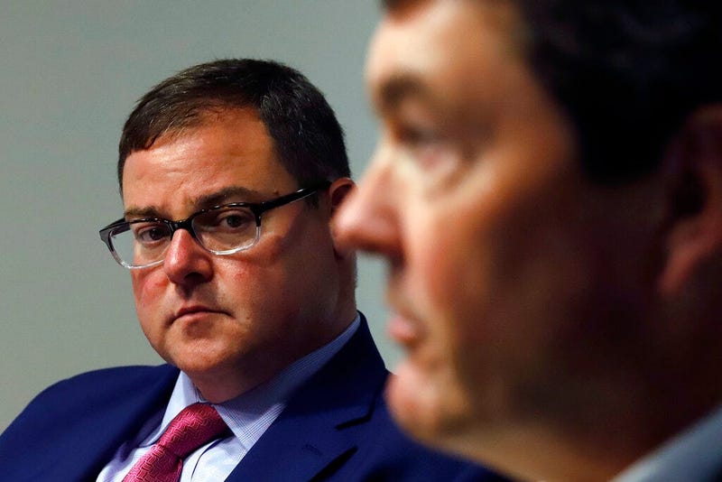 Pittsburgh Pirates Chairman of the Board Bob Nutting, right, meets with reporters to introduce Travis Williams, left, as the team's new president