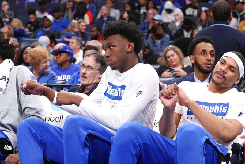 Memphis' James Wiseman, second from right, sits out the game along with Isaiah Stokes, right, in an NCAA college basketball game against Alcorn State Saturday, Nov. 16, 2019, in Memphis, Tenn. Malcolm Dandridge is first from right.