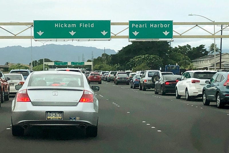 Traffic backs up at the main gates after a shooting at Pearl Harbor Naval shipyard, Wednesday, Dec. 4, 2019, near Pearl Harbor in Honolulu.
