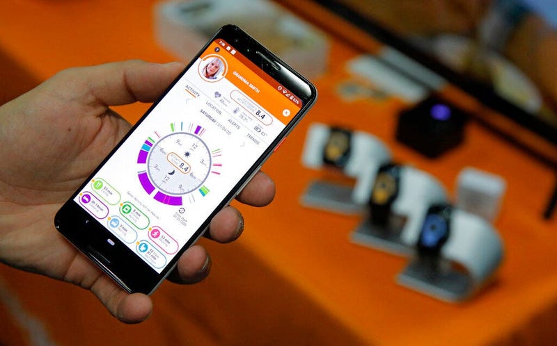 The app for the CarePredict Tempo Series 3 appears on display at the CarePredict booth during CES Unveiled before CES International, 