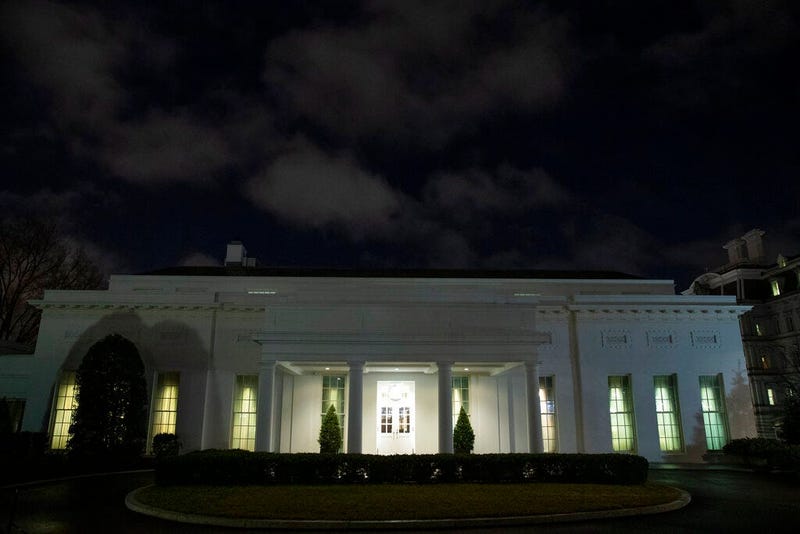 All the lights are on in the windows of the West Wing of the White House after news of a missile attack on an Iraqi air base housing U.S. troops, Tuesday, Jan. 7, 2020, in Washington.